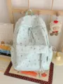 Green star print student backpack with front pocket and tassel zipper for casual daily use. - Single Bag / Green