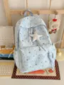Light blue star pattern backpack, cute canvas school bag for students and casual travel. - With Charm / Blue