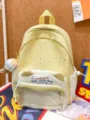 Yellow cat ear ita backpack with star pattern and transparent front pocket for pins and badges. - With Charm / S / Yellow