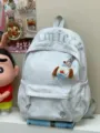 Hellgrauer minimalistischer Leinwand Rucksack mit Stickerei und Anhänger für Schule Alltag. - Mit Anhänger / Grau