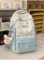 Cute pastel blue and white student backpack with cartoon pony print and plush pendant for daily use. - Blue (with Pendant)