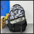 Sac à dos camouflage cool pour homme, grand sac d'école de voyage avec boucle avant. - Avec Pendentif Dinosaure / Camouflage Noir et Bleu
