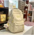 Mochila escolar bonita con estampado de estrellas estilo coreano para niñas amarillo - Mochila Amarilla con Colgante