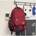 Mochila escolar de color solido estilo coreano gran capacidad viaje ocio para hombres - Rojo (con Colgante)