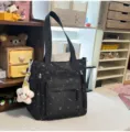 Bolso tote de lona negra con estampado estrellas, elegante bolso hombro casual con peluche estrella - Bolso de Hombro Negro con Colgante