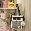 Black and white polka dot canvas tote bag with mesh pocket and cute hanging coin purse. - Single-Shoulder with Pendant / Black