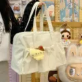 Casual canvas shoulder bag, large capacity commute travel tote with cute pendant for daily use. - With Pendant / White