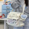 Korean style sweet ita bag detail with cute bows and transparent display window for pins. - White (with Blue Heart and Pendant)