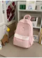 Sac à dos décontracté en toile rose avec poche à carreaux, idéal pour les voyages et étudiants. - Sac Individuel / S / Rose