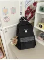 Sac à dos décontracté noir en toile avec poche à carreaux et charmant patch d'ours mignon - Avec Pendentif / L / Noir