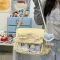 Korean style yellow canvas ita bag with transparent window, cute bows and shoulder strap. - Yellow (with Blue Heart and Pendant)