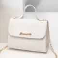 White textured crossbody bag with gold chain strap, stylish small square handbag for women. - White