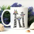 Detailed display of white ceramic coffee mug featuring a cute giraffes print and sunglasses. - 301-400ml / Giraffe Style