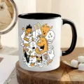 Cute doodle monster ceramic coffee mug with black handle, perfect for office and daily use. - Graffiti Monster