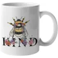 White ceramic coffee mug featuring a cute bumblebee and floral illustration design. - 301-400ml / 10