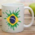 White ceramic coffee mug featuring a stylish Brazil flag and green paint splatter design. - 301-400ml / Style 3
