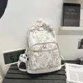 Stylish bamboo print canvas backpack with cute panda pendant for students daily use. - With Pendant / Off White