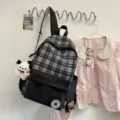 Mochila escolar de cuadros negro y gris estilo coreano gran capacidad estudiante - Con Colgante / Negro