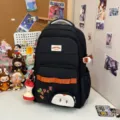 Gran mochila escolar negra para estudiantes con lindo colgante de manzana y bolsillo delantero. - Versión Mejorada con Colgante / Negro