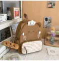 Cute brown cartoon student backpack with chef hat and cute face, stylish casual daily daypack. - Brown Small (With Pendant)