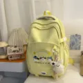 Bonita mochila estilo japonés gran capacidad bolsa escolar amarilla clara para estudiantes - Amarillo con Colgante