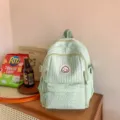 Mint green pleated school backpack for women, sweet style casual daypack with cute smiley patch. - Green