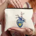 Bolsa cosmética de lona con cremallera y estampado de corazón anatómico estrellado. - Estilo 5