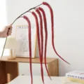 Red artificial hanging floral branch, preserved drooping plant stems for wedding home decor and interior design. - Red