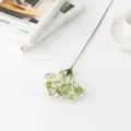 Detail view of artificial gypsophila flower branch, 5 prongs fake baby's breath for home decor. - White