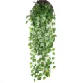 Artificial hanging green pothos plant vine detail with realistic leaves in basket. - Grape Leaf