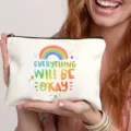 Hübsche Make-up-Tasche aus Leinen mit Regenbogen-Motiv und Spruch, ideal für Kosmetik. - Regenbogen Slogan Muster