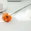 Artificial carnation flower branch single fake floral for home restaurant table decoration detail. - Orange