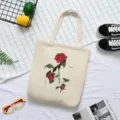 Bolso tote de lona con estampado gráfico de rosa roja, bolso de hombro informal para uso diario. - Estilo Rodaja de Rosa Roja