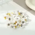Artificial mini white silk flower heads close up, perfect for DIY crafts and gift box decoration. - White