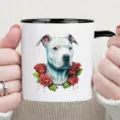Close-up of white ceramic coffee mug featuring detailed pitbull dog and red roses design. - Bulldog & Rose Style