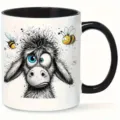 Close-up detail of the ceramic mug featuring a funny messy-haired animal graphic and bees. - Funny Animal Style