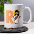 Close-up ceramic coffee mug detail, white cup with cute cartoon print, office drinkware item. - 6