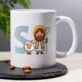 Detailed view of white ceramic coffee mug with custom cute cartoon shepherd print. - 12