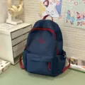 Zaino scolastico casual blu scuro con cerniera rossa ideale per studenti e uso quotidiano. - Blu scuro