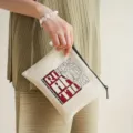 Pochette per cosmetici minimalista in tela con zip e stampa rock and roll alla moda. - Stampa stile rock