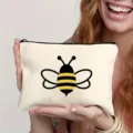Trousse de maquillage blanche en toile avec motif d'abeille mignon, sac cosmetique zippe. - Imprimé Abeille / 22x16cm / Blanc