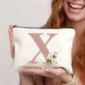 Trousse de toilette en toile avec design de lettre X personnalisée, pochette élégante. - Lettre X