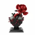 Detailed view of the creative building block rose and black heart model with display stand. - Rose Heart Building Block Set