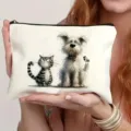 Detail view of white canvas cosmetic pouch featuring cute cat and dog illustration with zipper. - 7