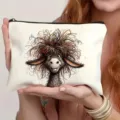 Close-up detail of white cosmetic bag featuring funny fluffy donkey print and black zipper. - 10
