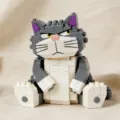 Gray cartoon cat building blocks toy, adorable brick model variant for desk decor. - Grumpy Little Grey Cat
