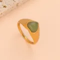 Close up detail shot of green heart gemstone titanium steel ring, simple fashion daily jewelry. - Size 6 / Gold Base Green