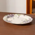 12-inch ceramic oval fish plate with elegant purple floral pattern, microwave and dishwasher safe. - 12-inch Lotus Edge Fish Plate / Milky White Glaze Purple Floral
