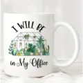 White ceramic office coffee mug detail showing greenhouse plant design quote print. - 7