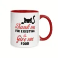 Detailed view of the ceramic coffee mug featuring funny cat graphic and contrasting red handle. - Style 14